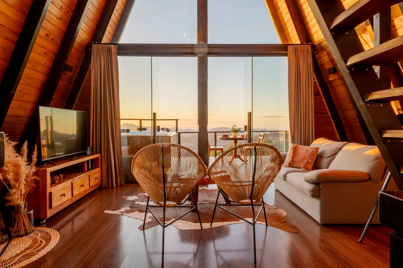 View from the living room through full-height glazing towards the terrace